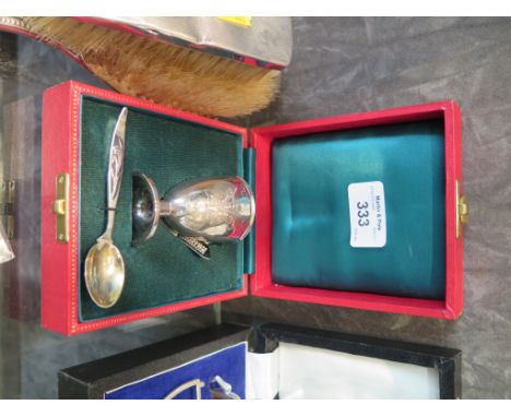 A Prince Charles egg cup and spoon