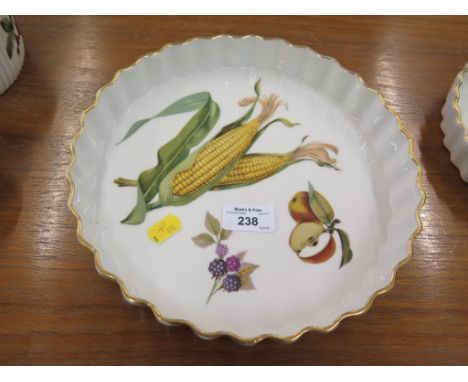 Royal Worcester Evesham pattern, three graduated souffle dishes, three graduated quiche dishes and four ramekins
