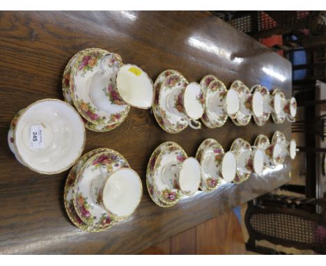 A set of eleven Royal Albert Old Country Roses pattern tea cups, saucers and plates, a jug and a further saucer and plate