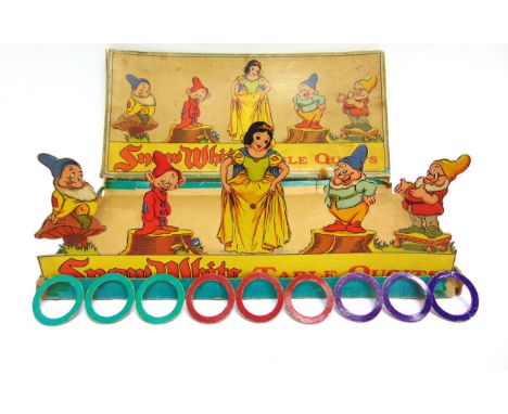 A CHAD VALLEY SNOW WHITE TABLE QUOITS GAME boxed, the box worn (corners split; lid lacking one end edge panel).