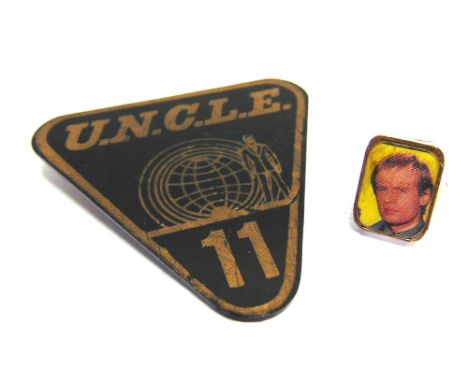 THE MAN FROM U.N.C.L.E. - ASSORTED COLLECTABLES  comprising a Corgi Waverley ring; and a Lone Star plastic pin badge, (2). 