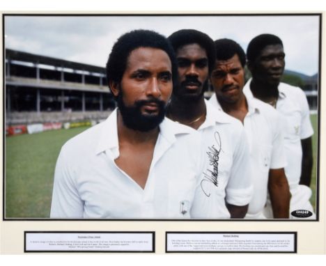 CRICKET - AUTOGRAPH, MICHAEL HOLDING (B.1954)  A colour portrait photograph, showing the subject with Andy Roberts, Colin Cro