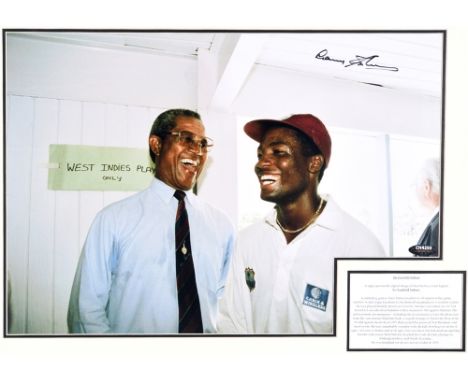 CRICKET - AUTOGRAPH, SIR GARFIELD SOBERS, A.O., O.C.C. (B.1936)  A colour portrait photograph, showing the subject with Brian