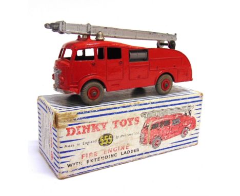 A DINKY NO.555, COMMER FIRE ENGINE WITH EXTENDING LADDER red with matching grooved hubs, silver ladders, very good condition,