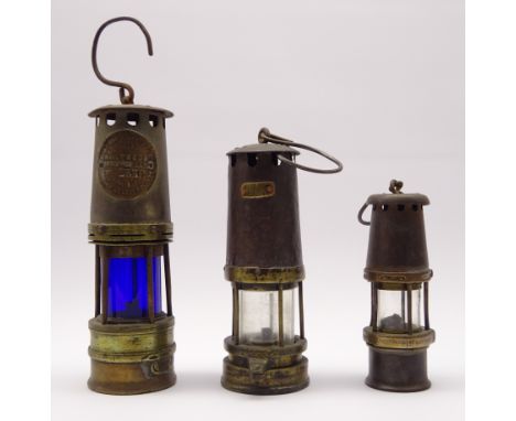 'Baby Wolf' Safety lamp by WM  Maurice Co. H18cm,  Hailwood and Ackroyd Ltd Improved Patent miner's lamp, no.257 and another 