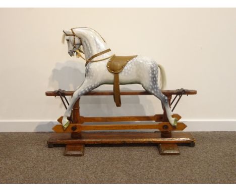 Early 20th Century dapple grey rocking horse by Ayres on a pine trestle base Height 79cm x L95cm Condition Report & Further D
