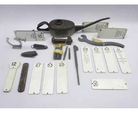 Twelve railway signal box tallies, B.R. oil can, LNER single ended spanner, two folding pocket knives, track bolt,  and other