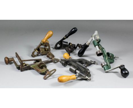 Five hand operated cartridge loading and crimping tools, various ages and calibres