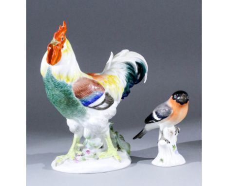 A 20th Century Meissen porcelain figure of a standing cockerel, 7.25ins high, incised "V130", and "104" (comb chipped), and a