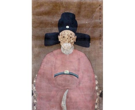 Chinese school - Scroll painting of a seated official, 23ins (50.3cm) x 15ins (38cm), mounted on handmade paper, in orange pa