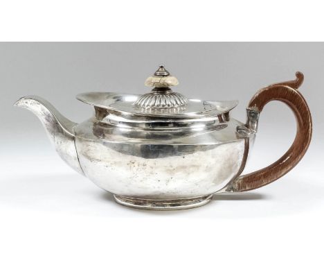 A George III silver circular teapot of squat form, the part reeded cover with turned finial, plain body and wooden C-scroll h