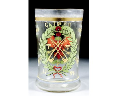 A German glass humpen enamelled in colours with an eagle within a leaf cartouche and the initials "S.GT." and "D.S", the othe