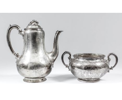 A Victorian silver baluster-shaped coffee pot with berry and leaf pattern handle, the whole engraved with floral sprays, with