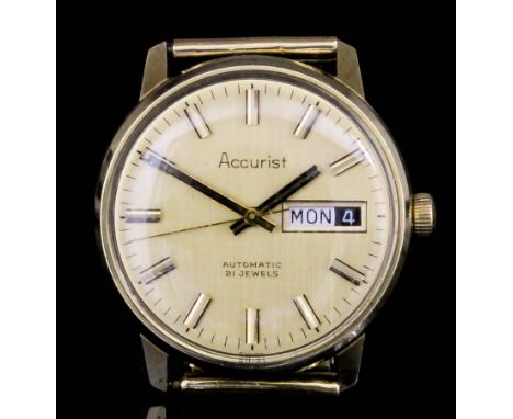 A 1970s gentleman's Accurist 9ct gold automatic wristwatch , the gilt dial with day/date aperture, baton numerals and sweep s