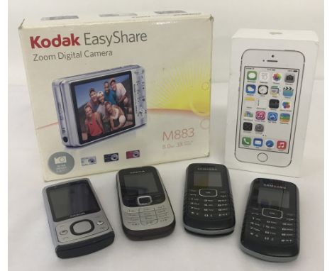 Collection of 4 vintage mobile phones together with a Kodak EasyShare M883 camera. To include Nokia 2330, Nokia 6700s and 2 x