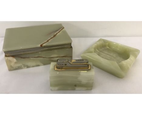 A vintage onyx smoking set, comprising: ashtray, lighter and cigarette box.  