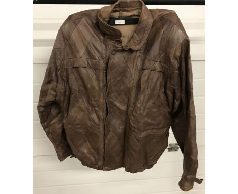 A vintage "Stylemaster" brown leather blouson jacket with harlequin design.  Size XL.