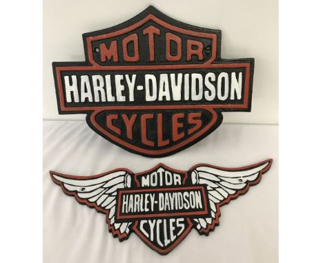 2 painted cast iron  Harley Davidson Wall hanging plaques, in red, black and white.  Largest approx. 26cm x 33cm.