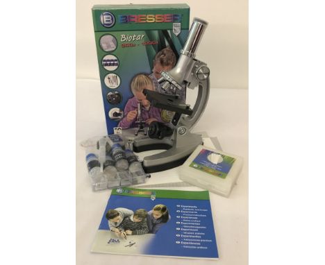 A Bressar Biotar 300x -1200x microscope. Complete with instructions and experiments booklet.  Accessories in unused condition