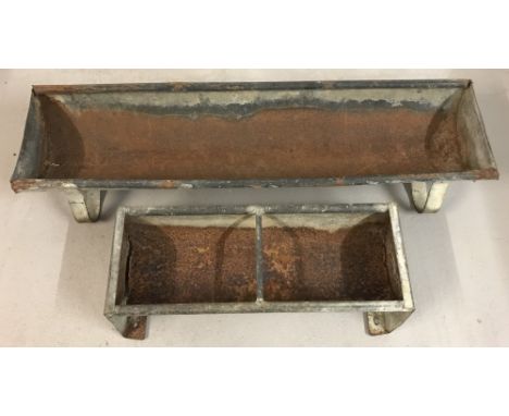 2 vintage galvanised feeding toughs. A short 2 sectional trough together with a longer, wide single section trough. Largest a