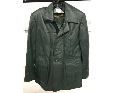 A vintage ladies green soft leather coat by Buades. Button fastening with 2 large pockets. Size 52.