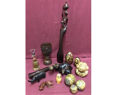 A collection of vintage and modern wooden items, some carved. To include: Russian stacking dolls, vintage novelty bottle open