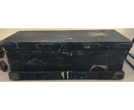 A vintage pine tool chest with metal banded bottom corners and interior tool shelf.  Approx. 31cm x 90cm x 37cm.