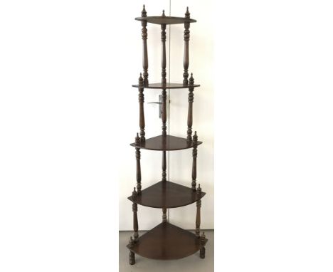 A vintage dark wood 5 shelf corner wotnot with turned columns and finial detail.  Approx. 152cm tall x 53cm wide.