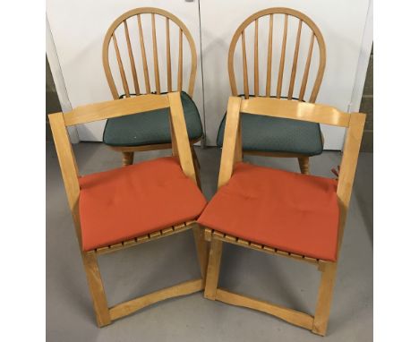 4 vintage light wood chairs. 2 wheel back kitchen chairs together with 2 folding chairs.  