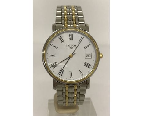 A men's two tone "Desire" Tissot wristwatch with stainless steel strap, in working order. Roman numeral hour markers with dat