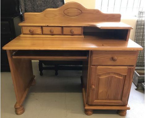 A modern pine dressing table/desk with curved upper shelf and 3 small drawers. Lower pedestal has single drawer and single do