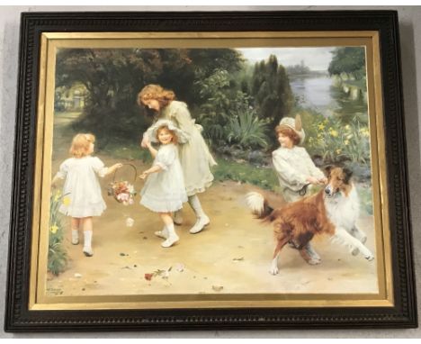 A vintage oak framed signed print of children playing with a dog . Framed and glazed with gilt mount. Frame size approx. 58cm