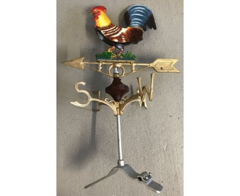 A modern painted cast metal weather vane with cockerel detail. Complete with fixing plate. Approx. 75cm tall.