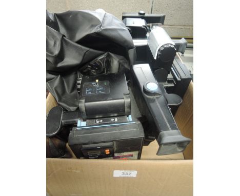 Three Polaroid Studio Express cameras and a Polaroid Mini Portrait camera