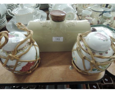 Two ceramic ginger jars and footwarmer