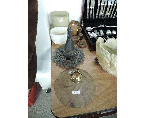 A selection of hardware items including marbled light shade and lead light finneal