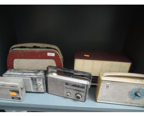 A selection of vintage radios, including transistor
