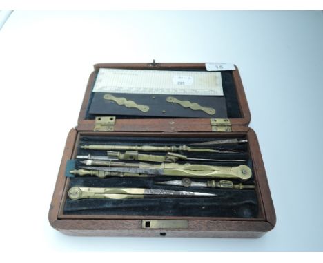 A geometry set with brass pieces