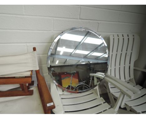 A circular hall way mirror