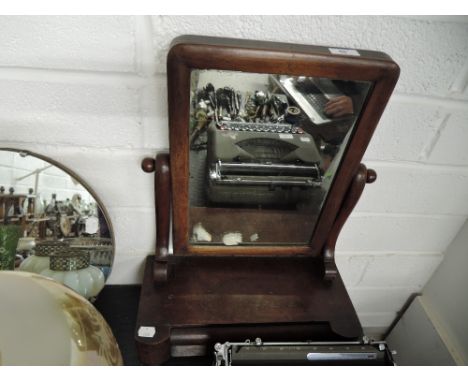 A mahogany framed bathroom or similar shaving mirror with integral drawer