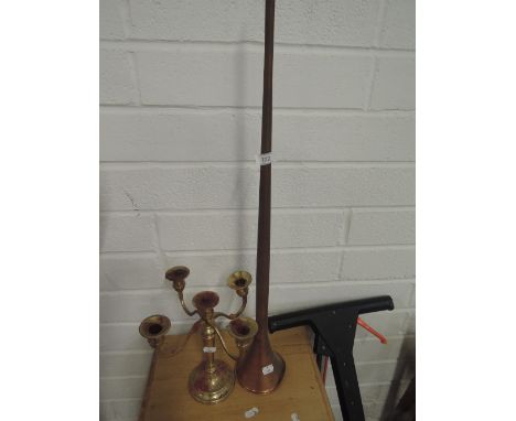 A five tier candle stick and copper post horn