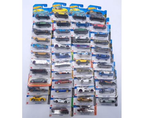 Hot Wheels Mattel a small carded group comprising of TV related and other, to include; HKG99-M521 21A Batmobile as well as ot