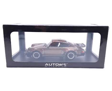 Autoart (Autoart Millennium),&nbsp; a boxed 1:18 scale No.77973 Porsche 911 3.0 Turbo in Brown Copper Metallic. Condition app