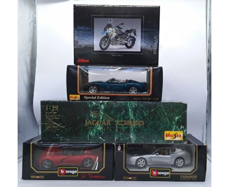 Maisto, Burago and Schuco a boxed car and motorbike group comprising of 1:18/1:12/1:10 scale models. Conditions appear Good w