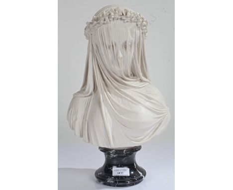 Parian ware bust, 'The Bride', after the R. Monti original, the veiled bride wearing a garland of flowers to her hair, signed