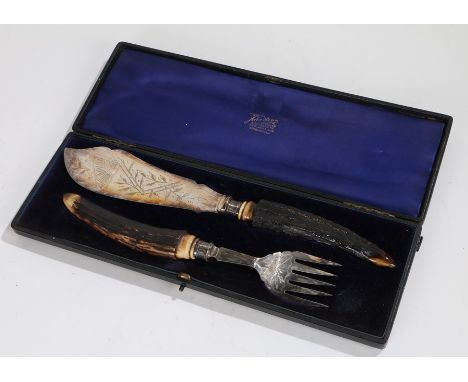 Late Victorian fish serving knife and fork, each with antler handles, silver collars (Sheffield 1892), and silver plated blad