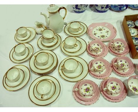 Large quantity German porcelain gilt bordered coffee ware and a New Chelsea china tea service for six persons, violet decorat