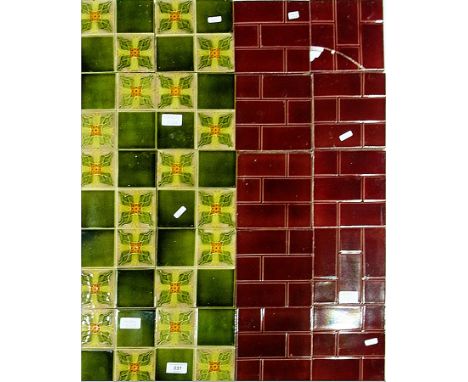Set of ten green and yellow glazed ceramic tiles and others, red glazed