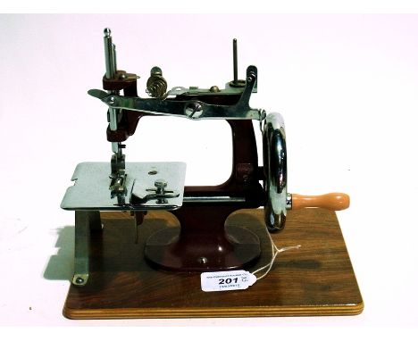 Pelham puppet Mitzi J598 (boxed), miniature sewing machine, ironing board and typewriter (4)