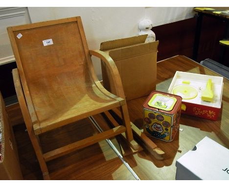 Child's bentwood rocking chair, a Fisher Price music box record player, boxed, Burbank toys and a tinplate Jack-in-the-box